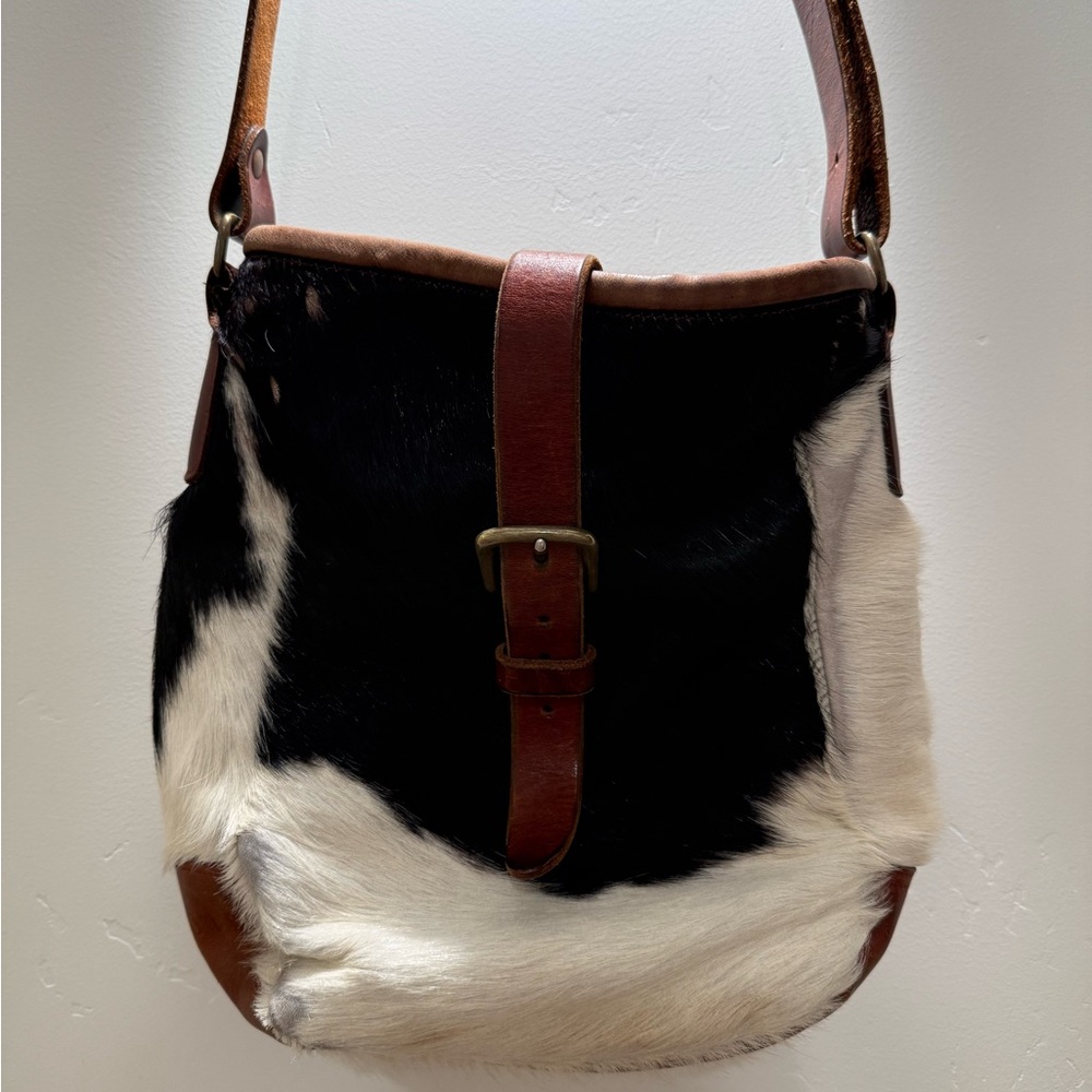 Black and White Cow Print with Brown Leather Bag